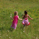 little girls in open field